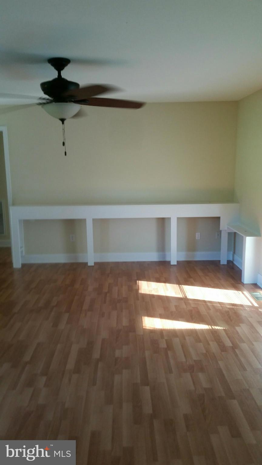 731 Ell Downes Road Henderson, MD 21640 - Photo 16 of 21 Living Room