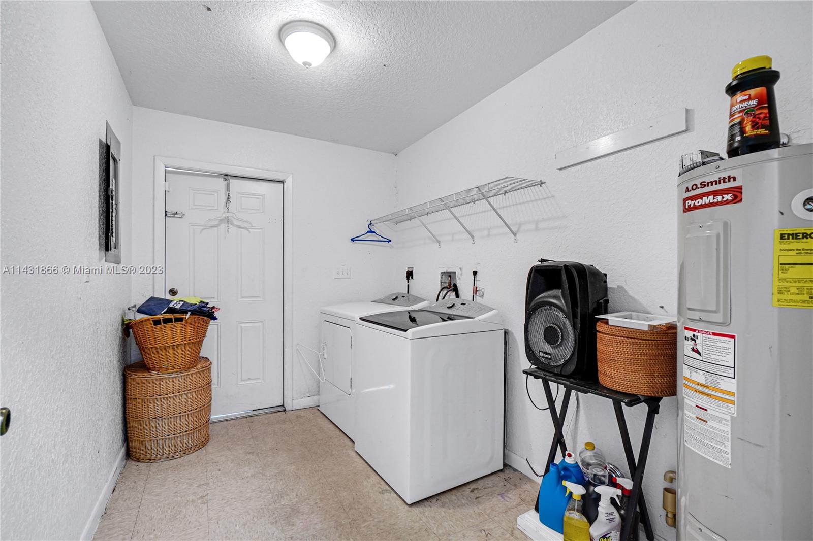 24313 Southwest 130th Avenue Homestead, FL 33032 - Photo 11 of 23 a utility room with dryer and washer