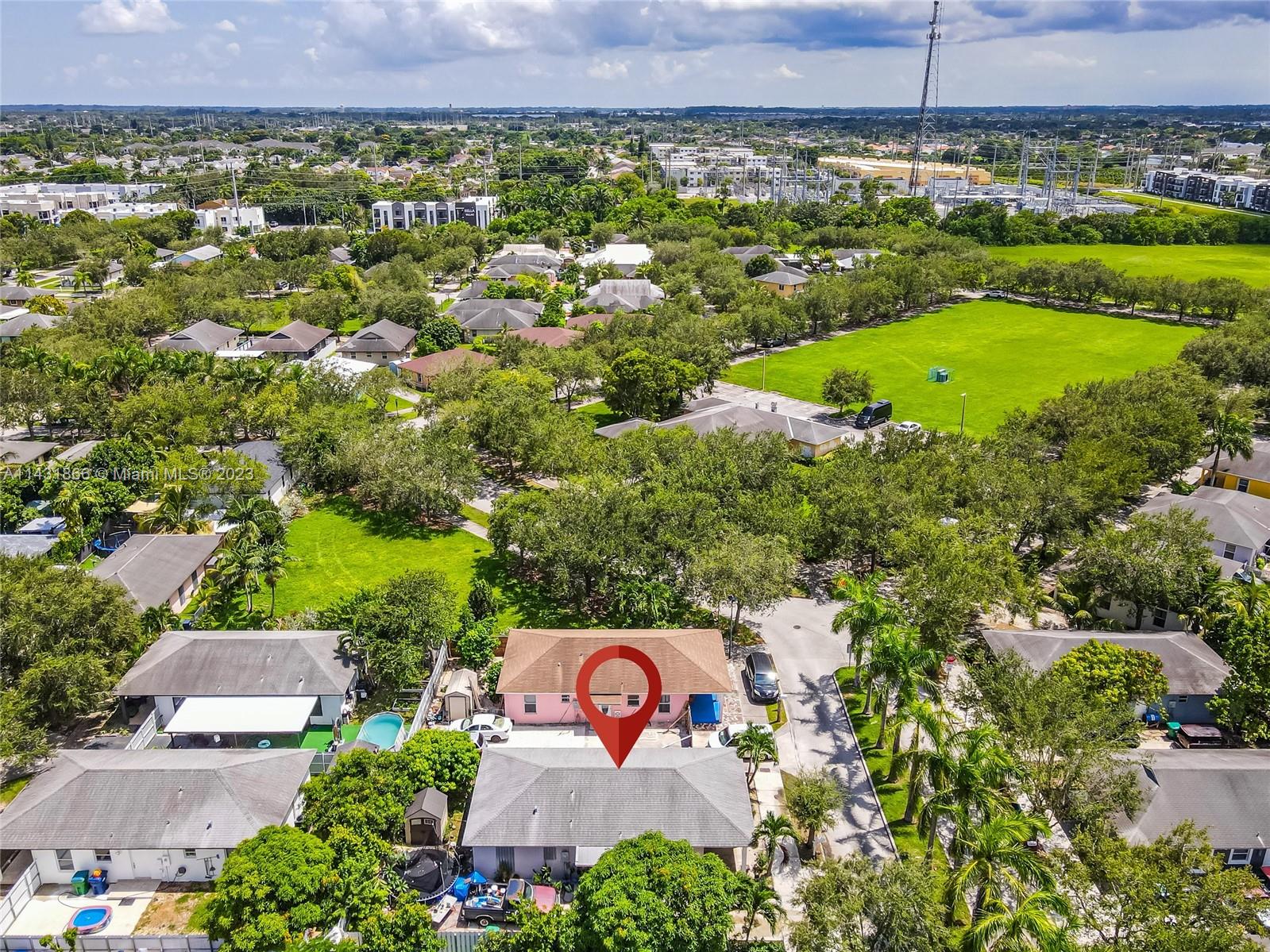 24313 Southwest 130th Avenue Homestead, FL 33032 - Photo 20 of 23 an aerial view of a house with a yard
