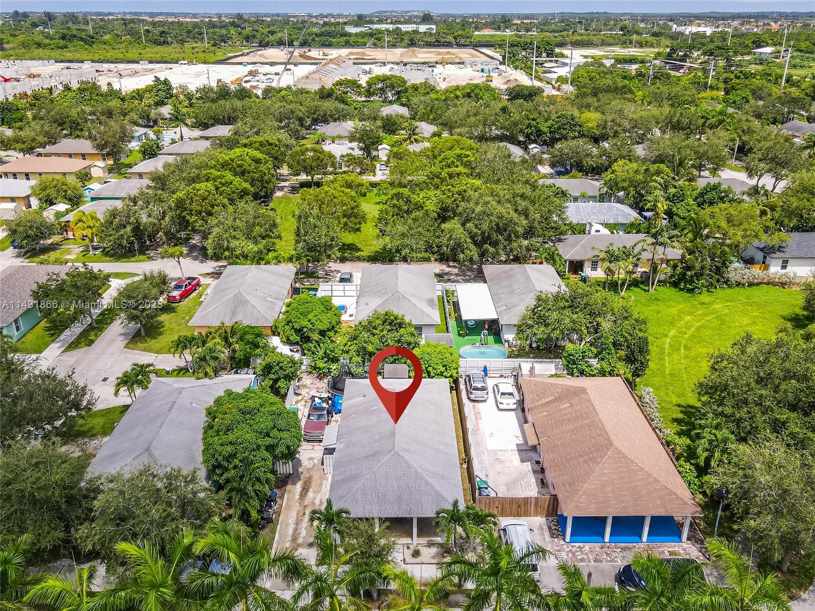 24313 Southwest 130th Avenue Homestead, FL 33032 - Photo 22 of 23 an aerial view of a house with yard swimming pool and outdoor seating