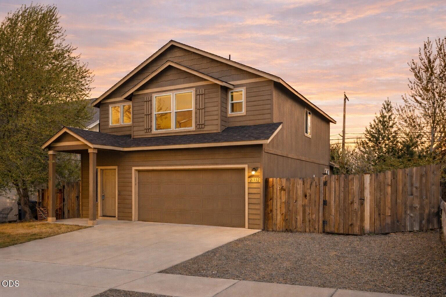21332 Oconnor Way Bend, OR 97701 - Photo 11 of 33 a front view of a house with a garage