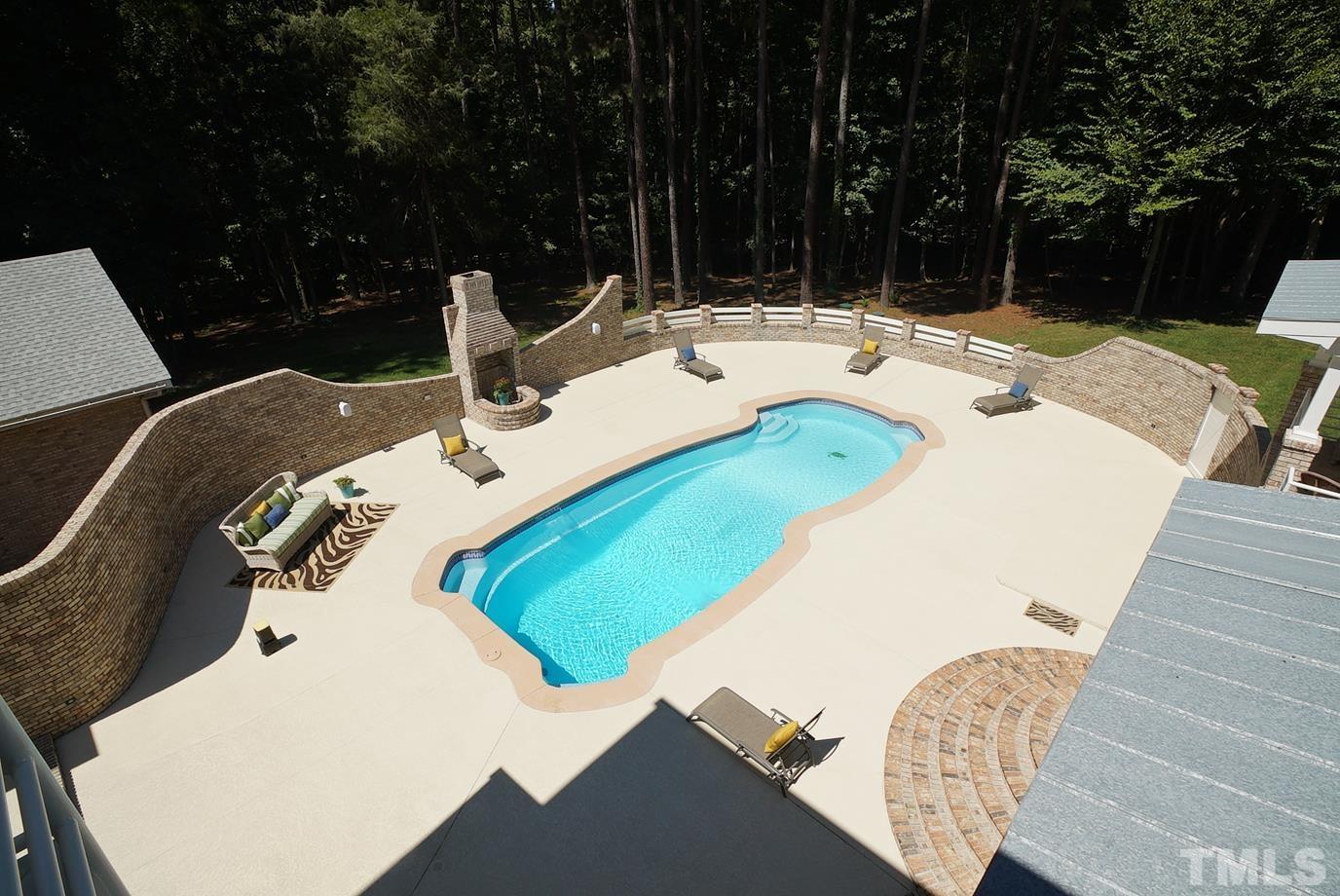 6007 Graystone Drive Chapel Hill, NC 27514 - Photo 16 of 30 View from the bonus room balcony of the private pool with fire pit.