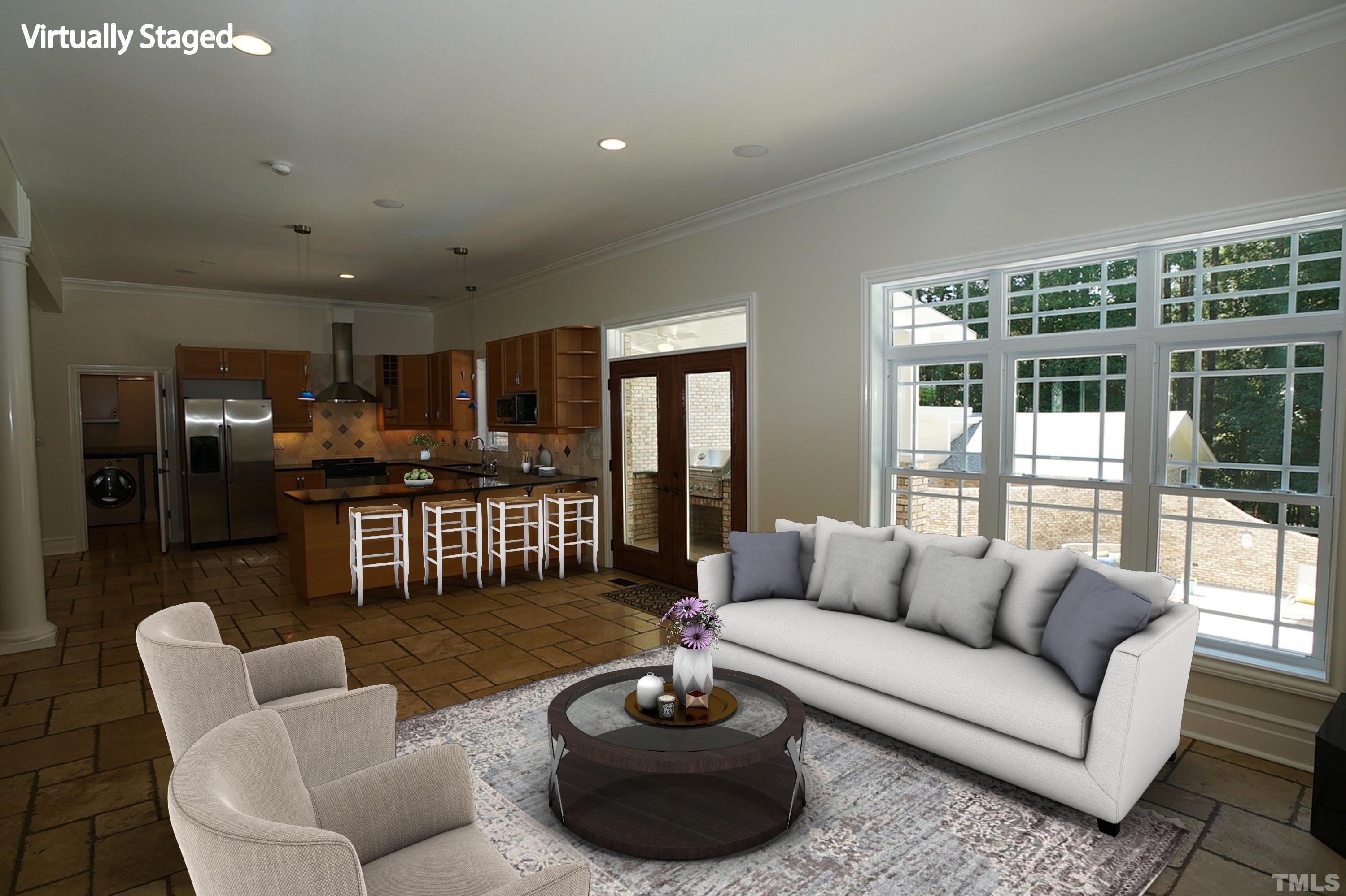 6007 Graystone Drive Chapel Hill, NC 27514 - Photo 3 of 30 Living area has French doors to the covered balcony and pool area.