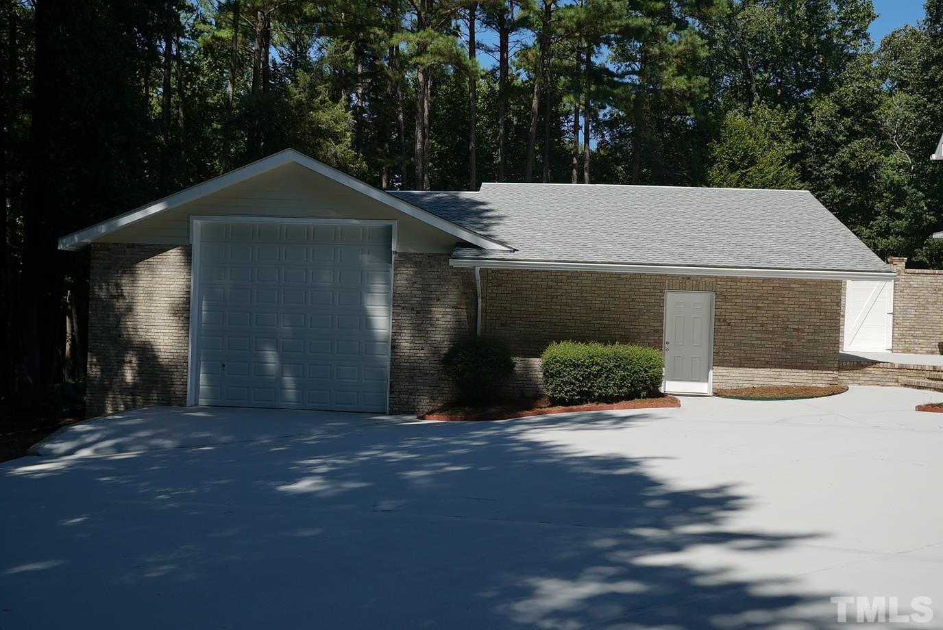 6007 Graystone Drive Chapel Hill, NC 27514 - Photo 25 of 30 Detached, oversized garage and workshop/storage provides space for large RV, boat, multiple cars, etc.