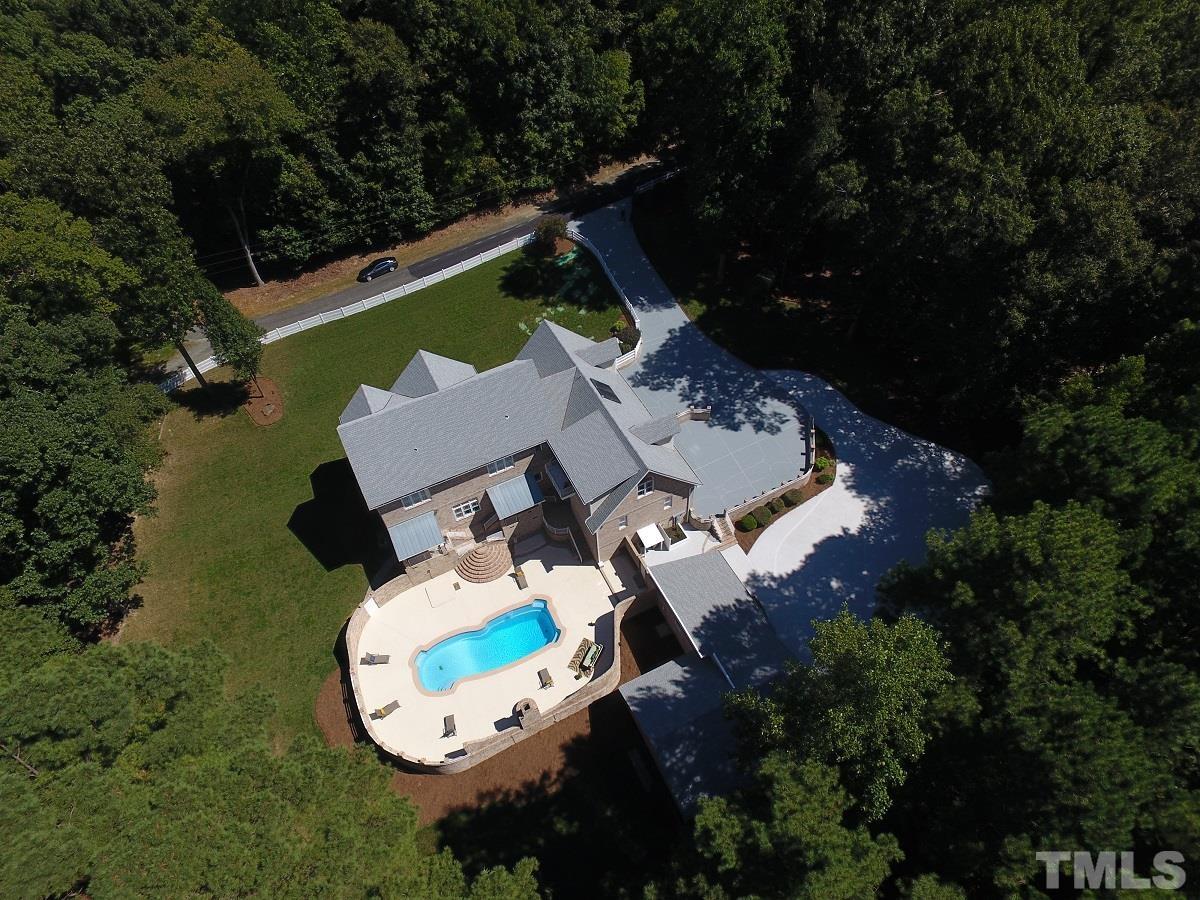 6007 Graystone Drive Chapel Hill, NC 27514 - Photo 27 of 30 This retreat is situated on a private 2.12-acre lot.