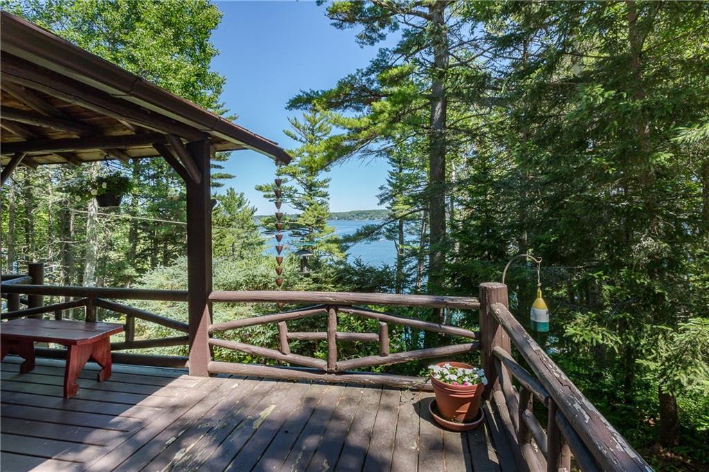 29 Crooked Pine Road Boothbay Harbor, ME 04538 - Photo 3 of 27 Side deck to cottage with amazing views.