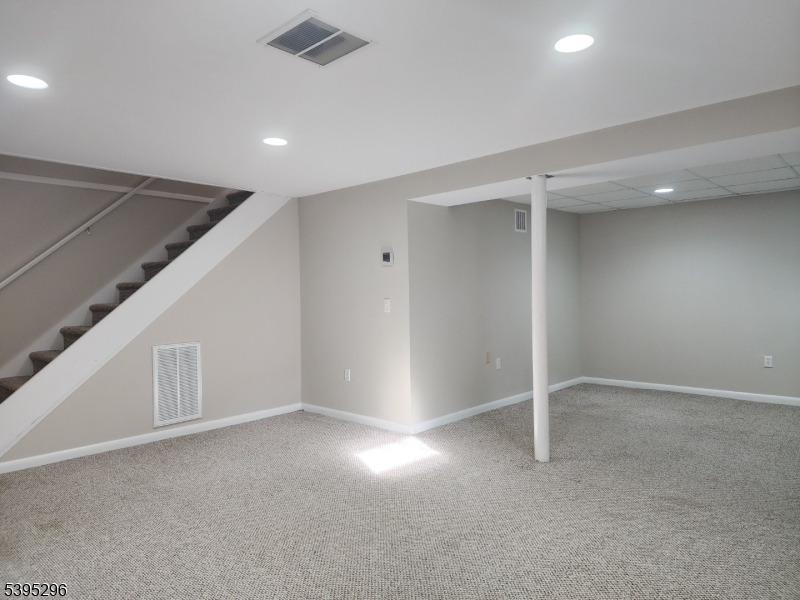 84 Reservoir Avenue Butler, NJ 07405 - Photo 15 of 20 an empty room with windows