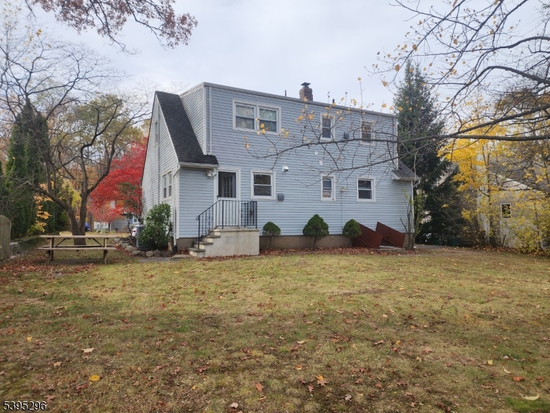 84 Reservoir Avenue Butler, NJ 07405 - Photo 19 of 20 a view of a house with a yard