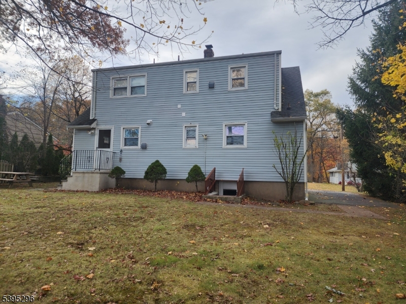 84 Reservoir Avenue Butler, NJ 07405 - Photo 20 of 20 a view of house with outdoor space
