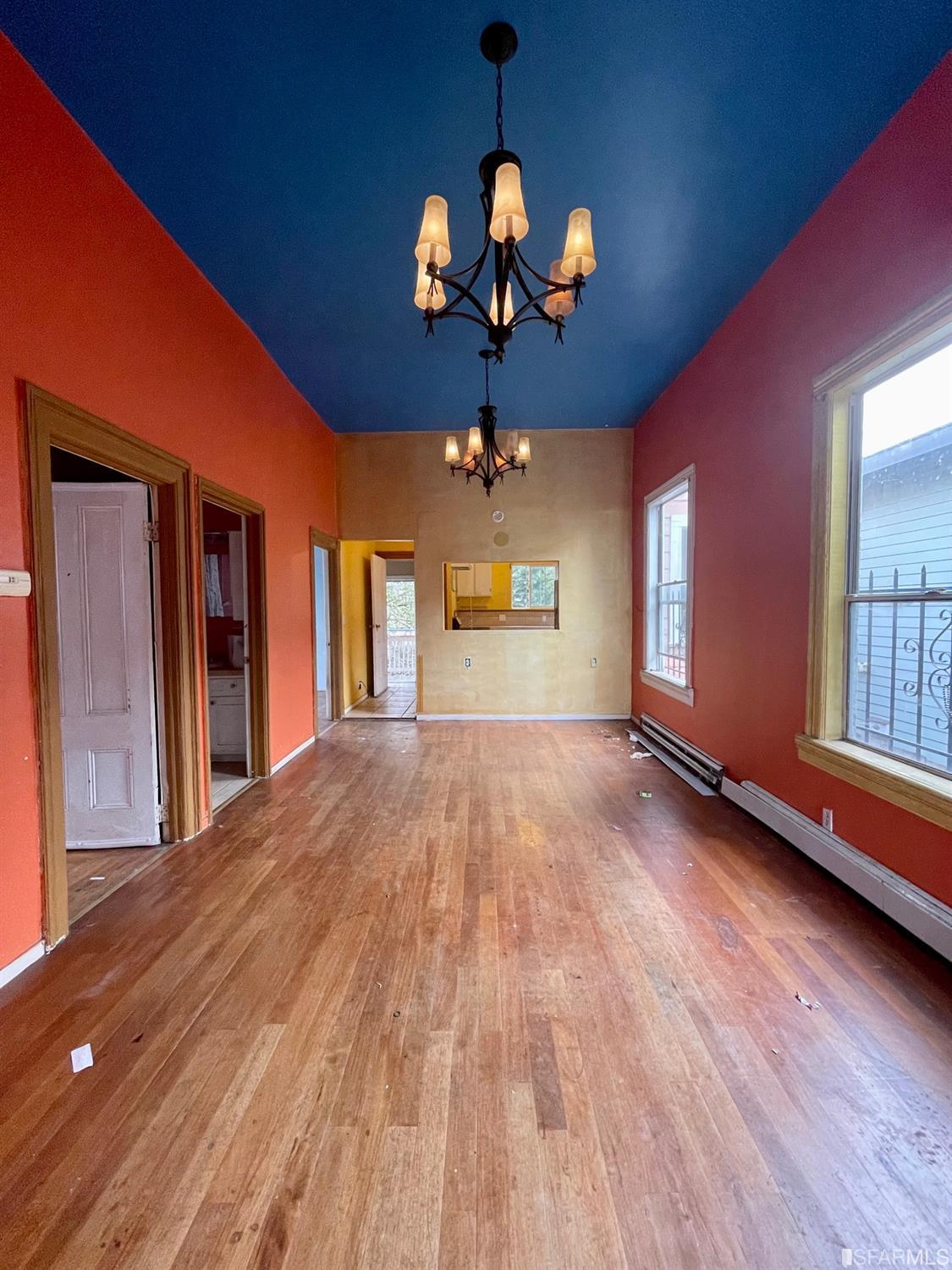 1022 24th Street Oakland, CA 94607 - Photo 2 of 9 a view of a livingroom with a chandelier
