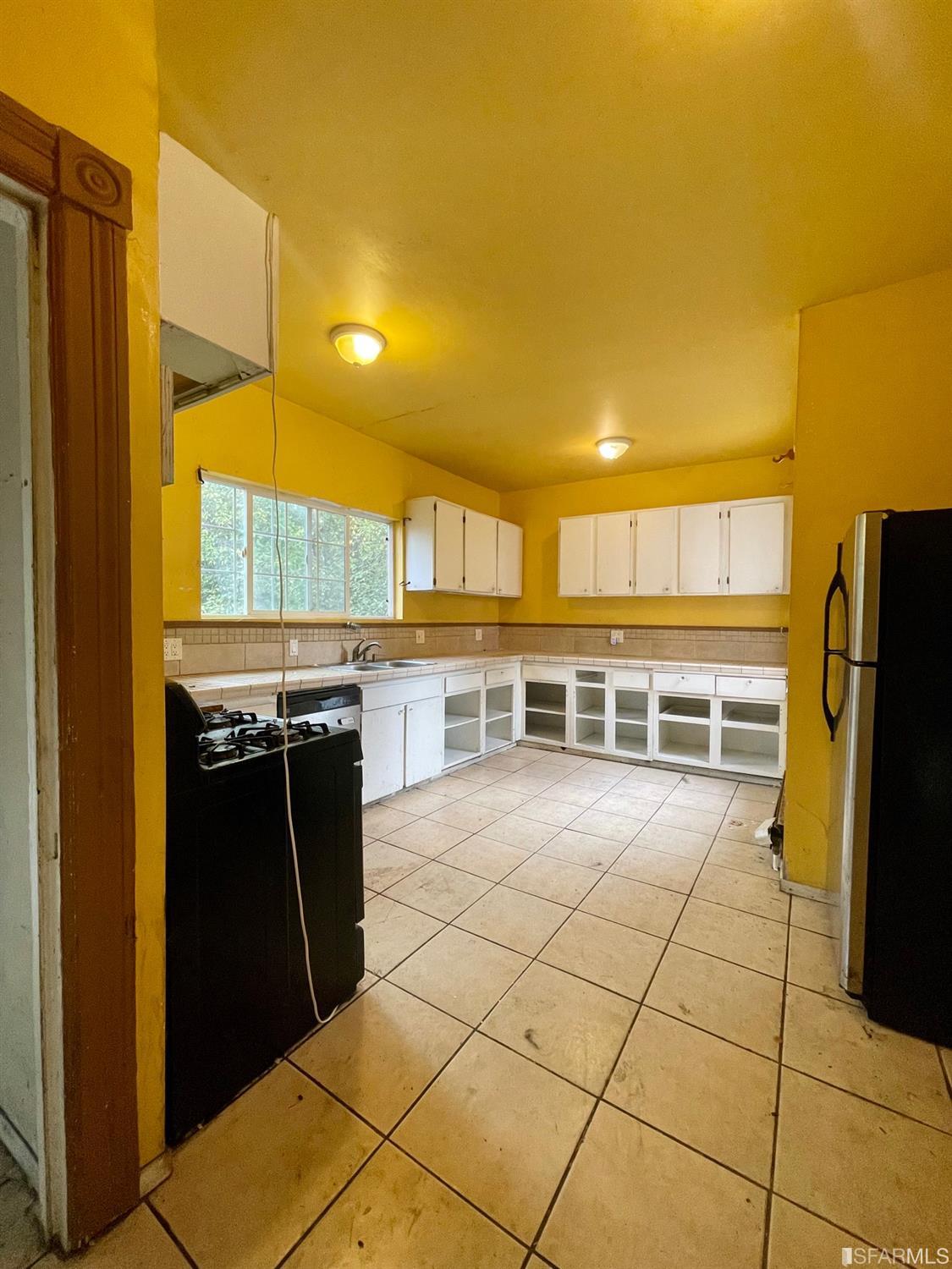1022 24th Street Oakland, CA 94607 - Photo 6 of 9 a view of a kitchen with a sink