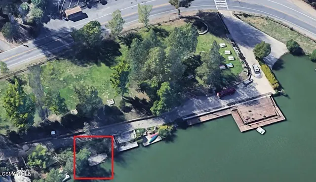 an aerial view of a house with a garden