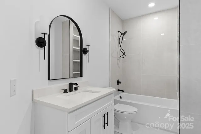 a view of balcony with couch and chairs