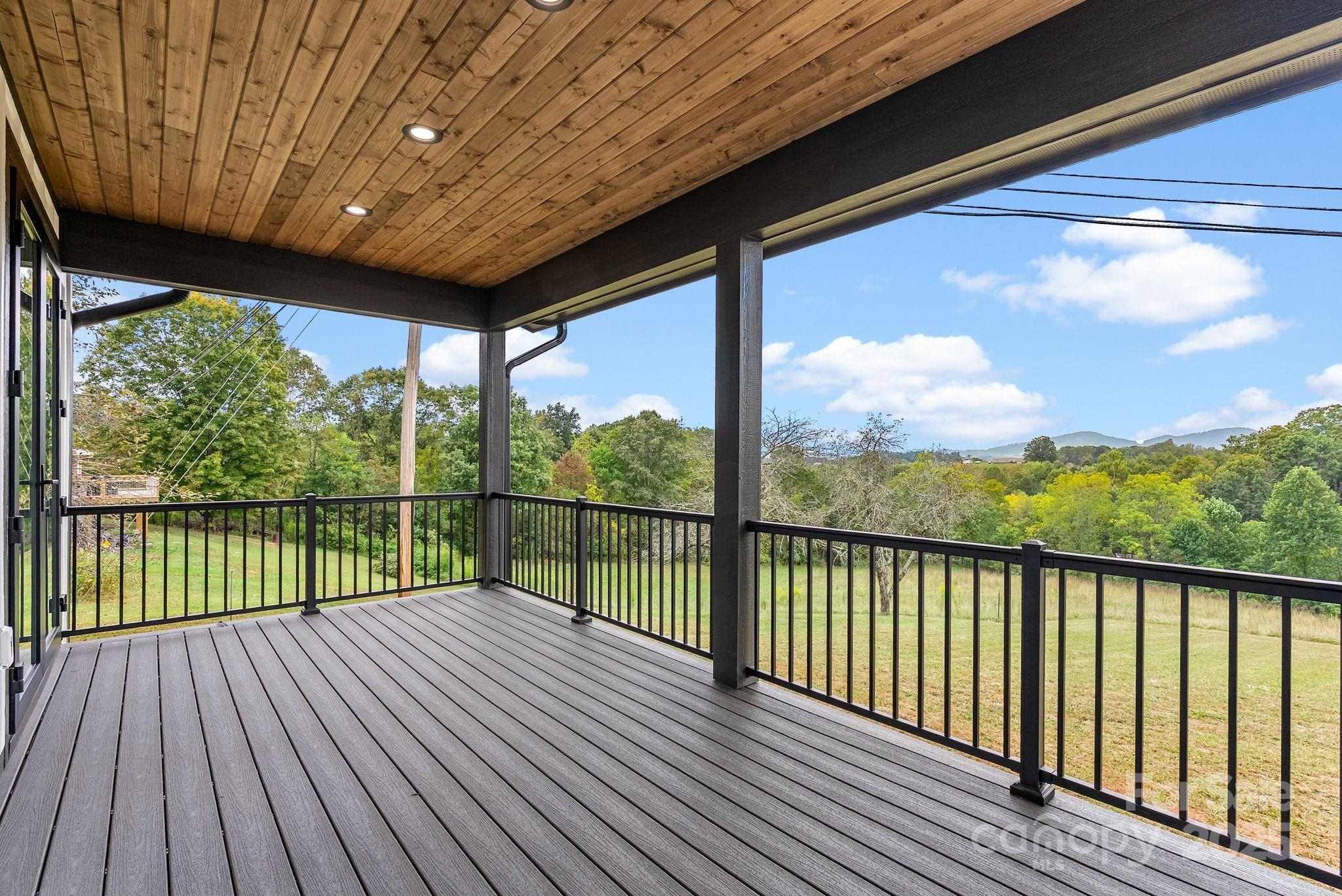 1148 Alexander Road Leicester, NC 28748 - Photo 21 of 47 a view of balcony with wooden floor