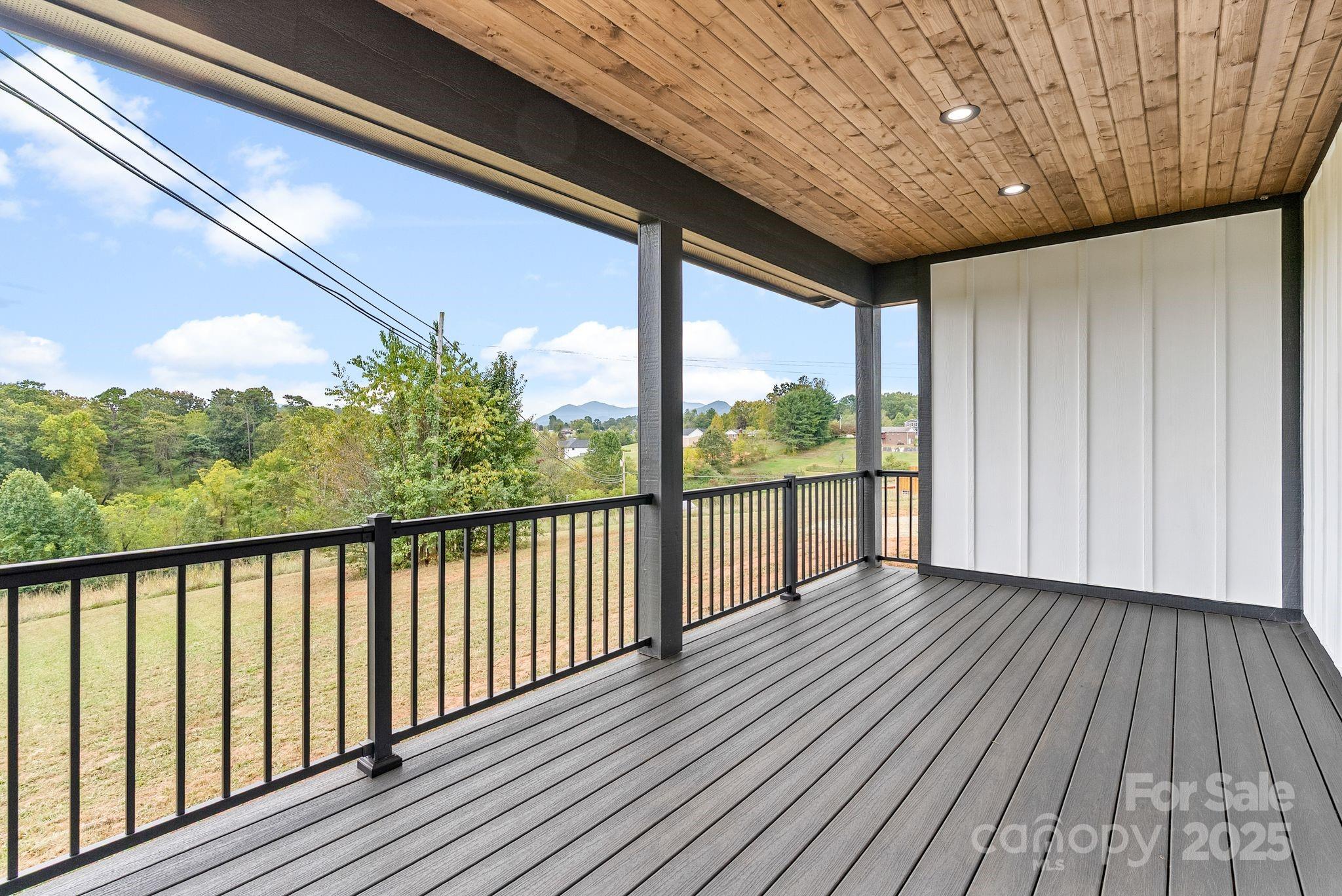 1148 Alexander Road Leicester, NC 28748 - Photo 22 of 47 a view of balcony with wooden floor