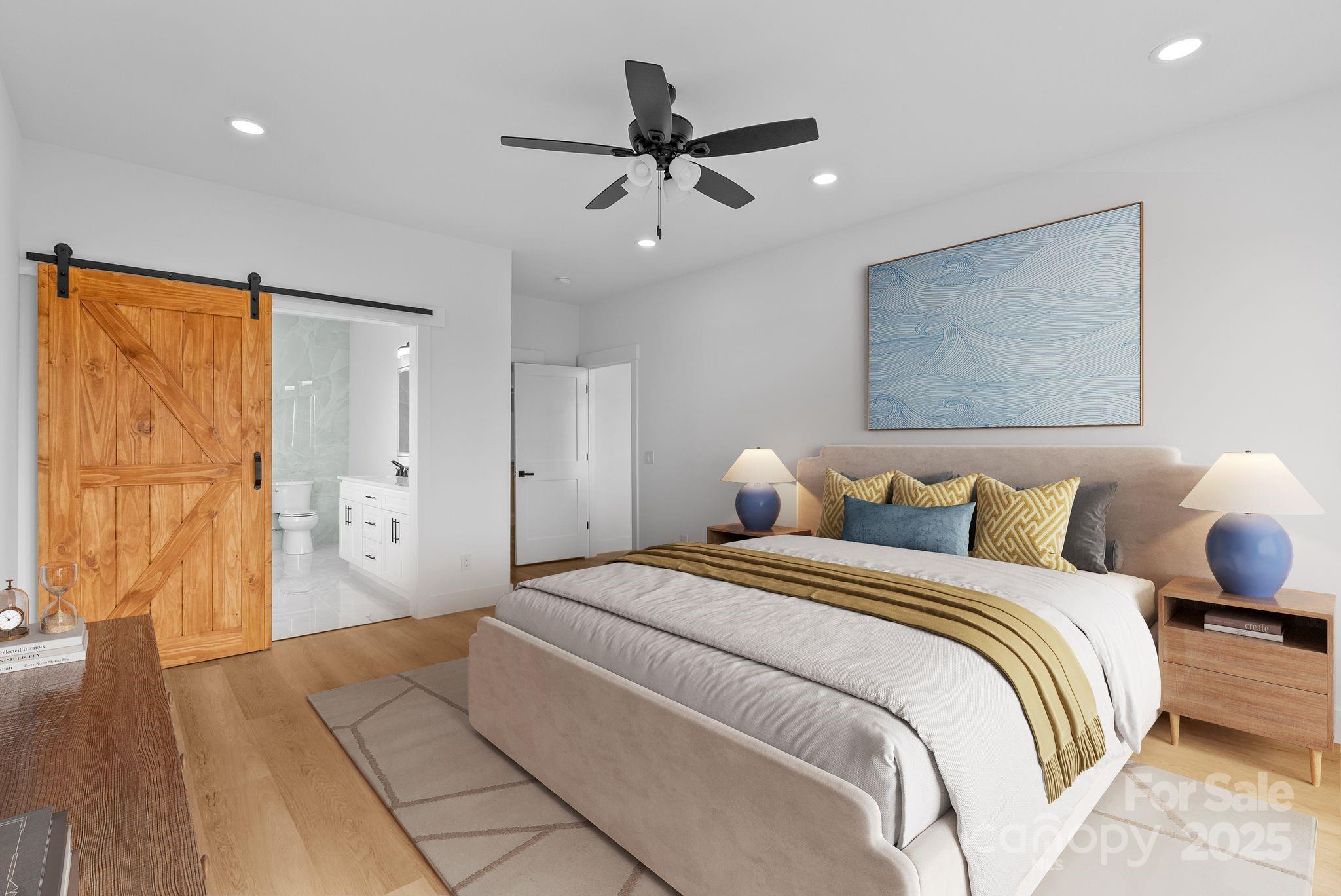 1148 Alexander Road Leicester, NC 28748 - Photo 23 of 47 a bed room with a bed and a chandelier