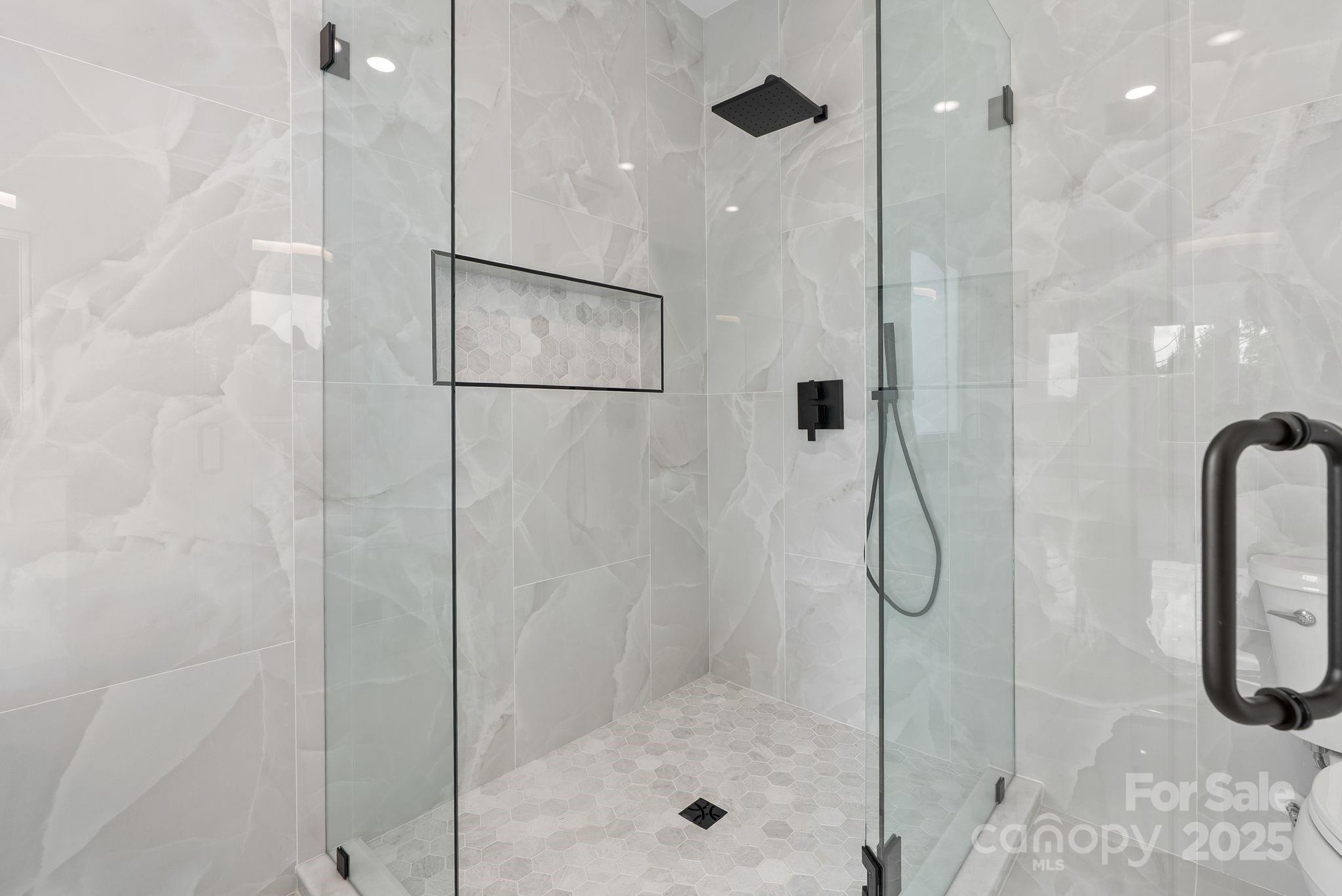 1148 Alexander Road Leicester, NC 28748 - Photo 27 of 47 a bathroom with a shower