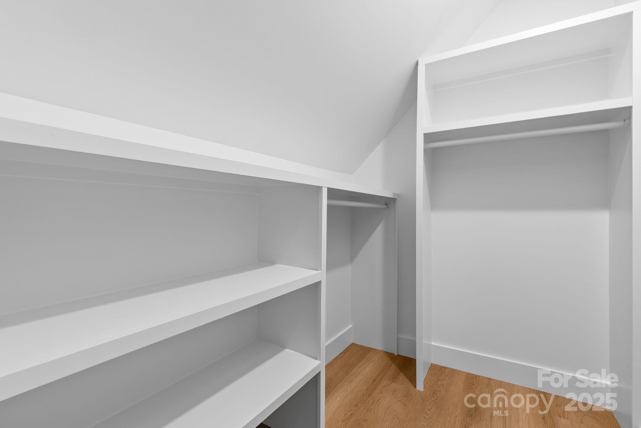 1148 Alexander Road Leicester, NC 28748 - Photo 37 of 47 a view of an empty walk in closet