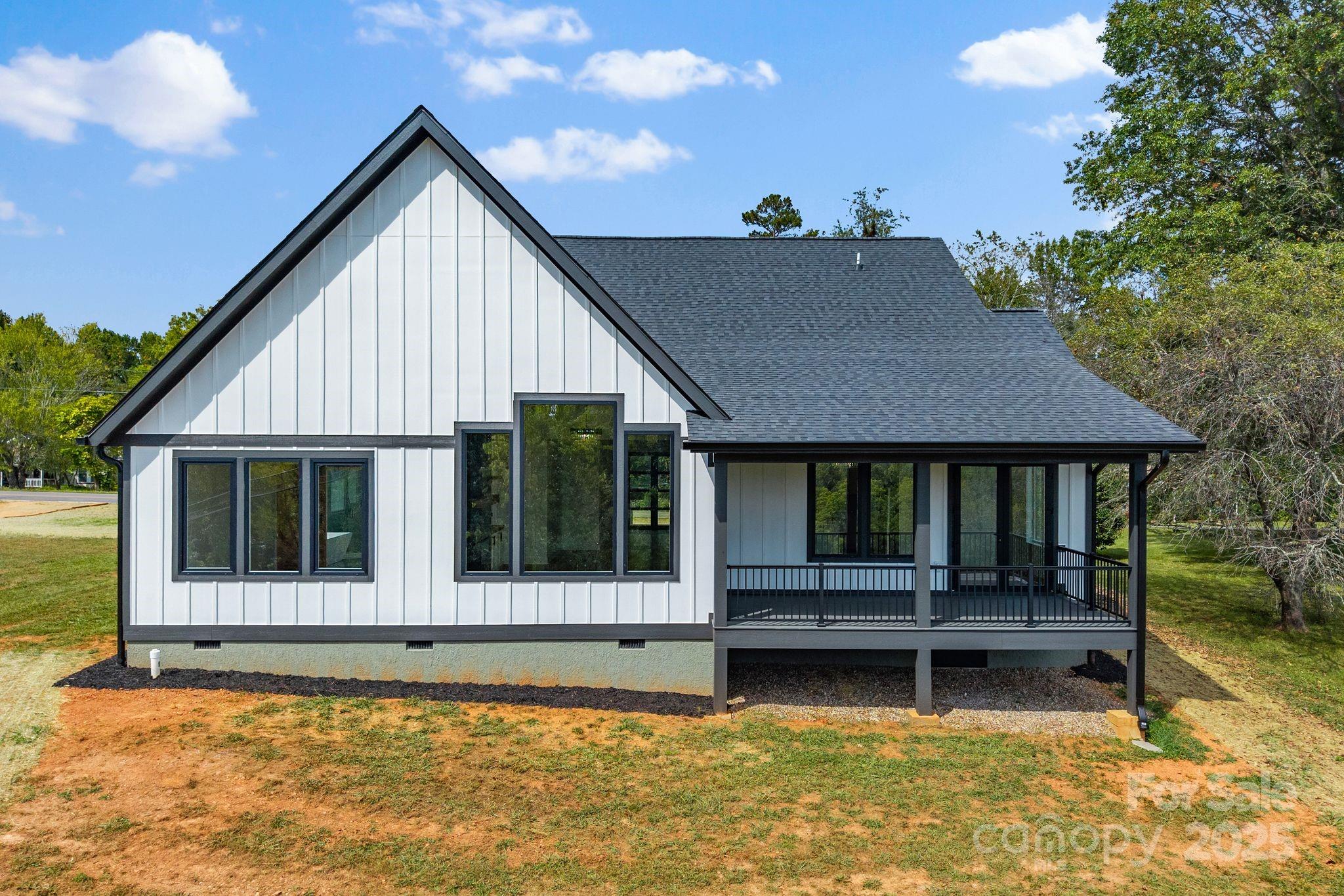 1148 Alexander Road Leicester, NC 28748 - Photo 43 of 47 a view of a house with swimming pool and sitting area