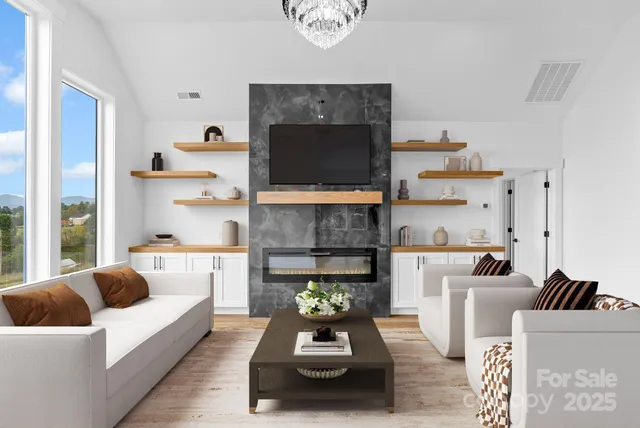 a view of wooden floor and a window in an empty room