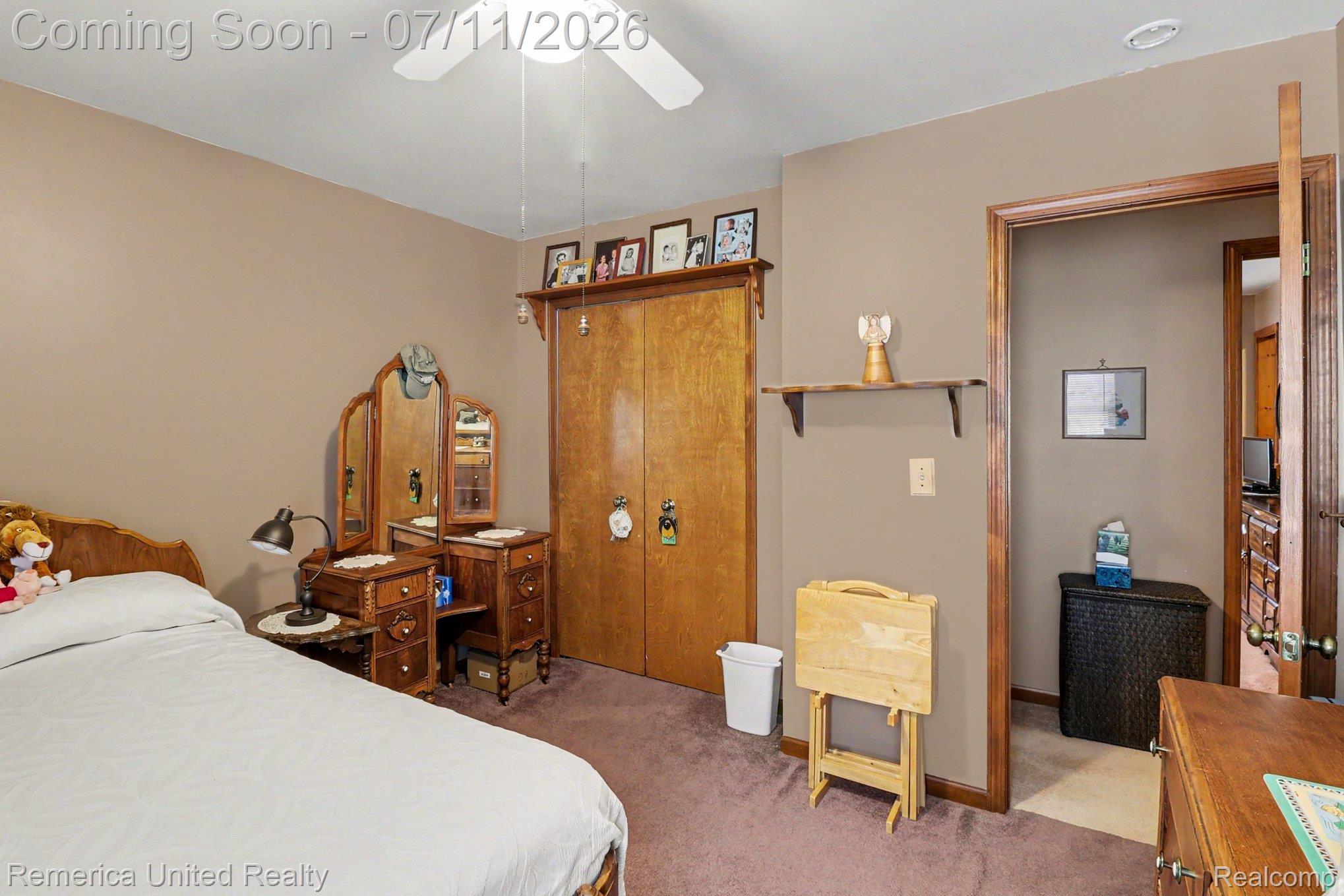 136 Endicott Howell, MI 48843 - Photo 20 of 28 Neutral-toned walls complement a ceiling fan with integrated lighting