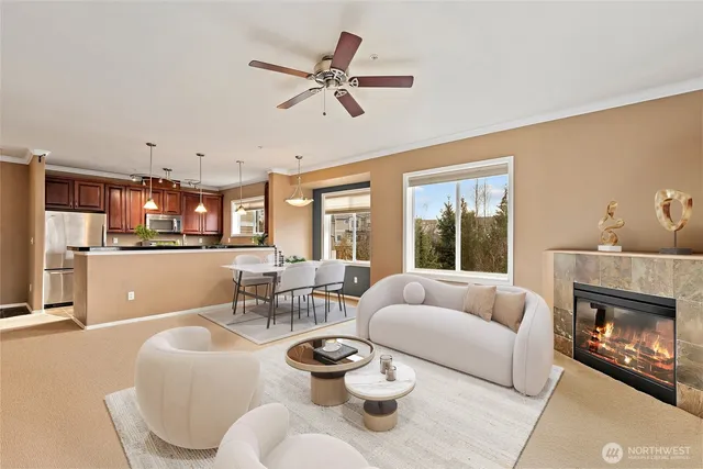 a living room with furniture and a fireplace