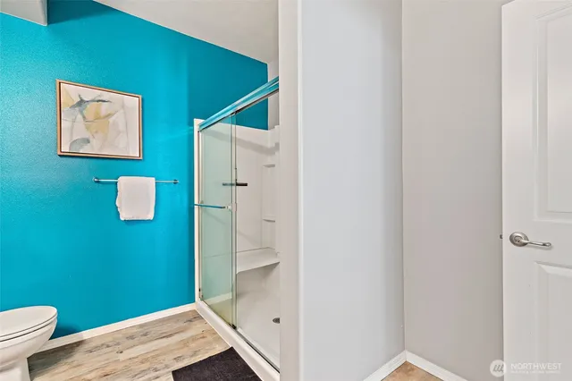 a bathroom with a toilet and a sink