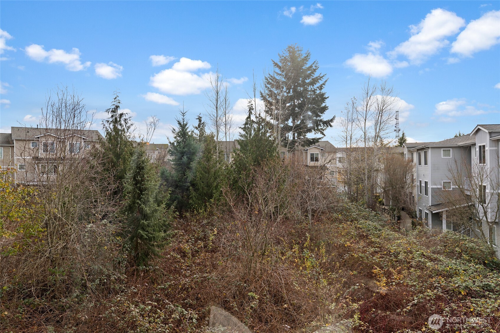 14915 38th Drive Southeast, Unit 2049 Bothell, WA 98012 - Photo 24 of 36 a view of a multi story yard