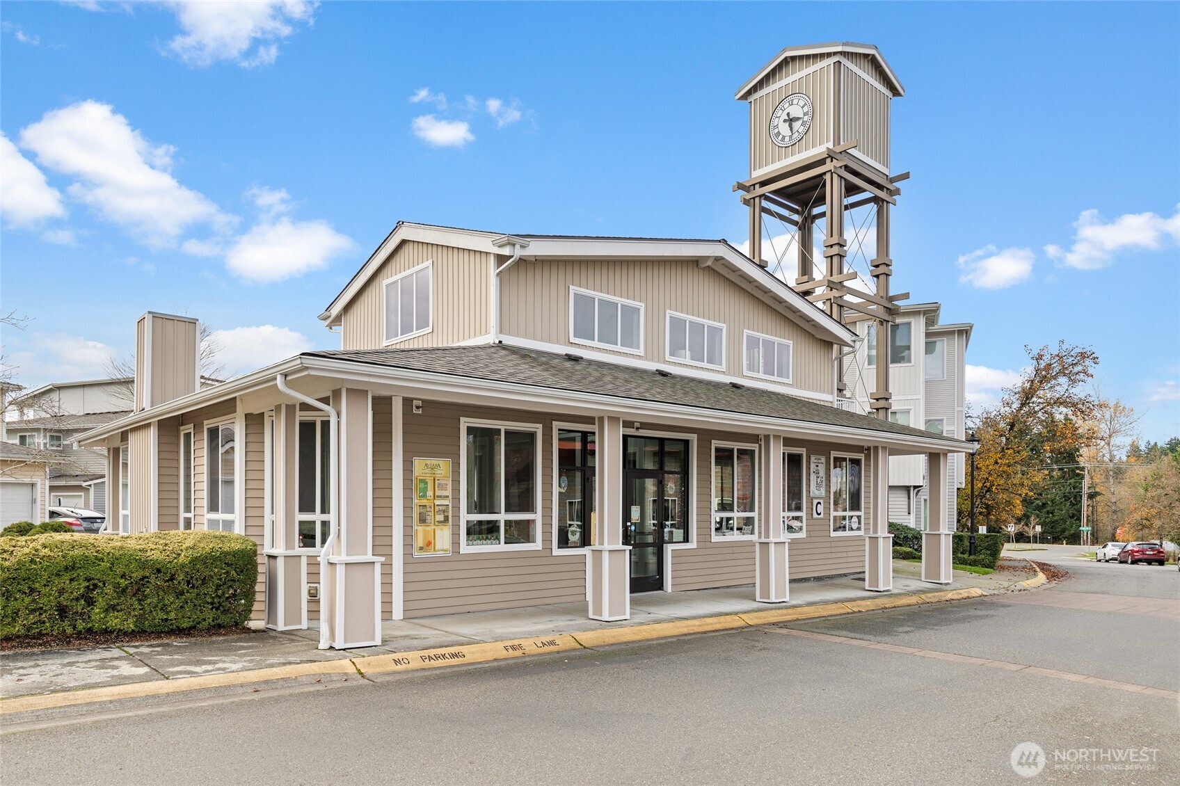 14915 38th Drive Southeast, Unit 2049 Bothell, WA 98012 - Photo 28 of 36 a front view of a house with a garden