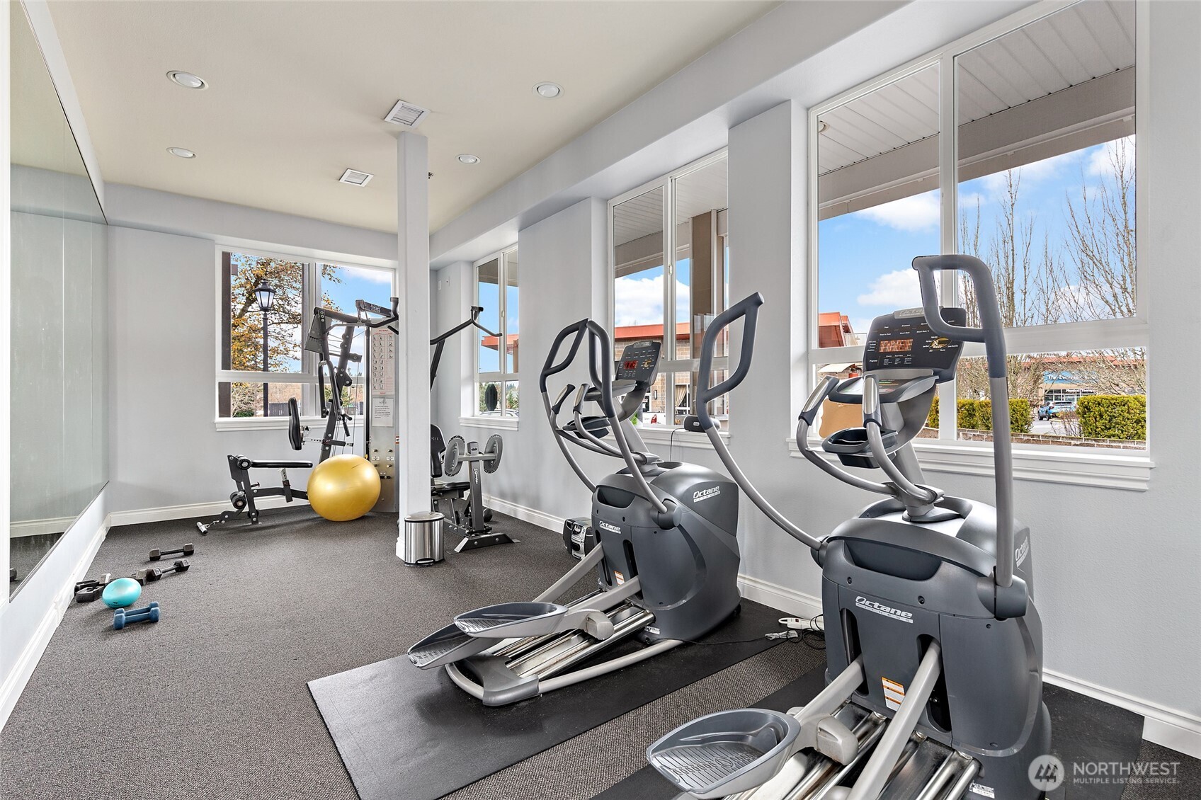 14915 38th Drive Southeast, Unit 2049 Bothell, WA 98012 - Photo 32 of 36 a view of a room with gym equipment