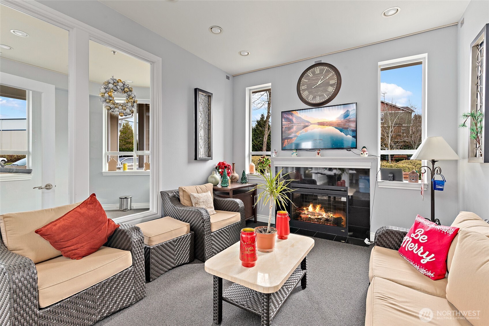14915 38th Drive Southeast, Unit 2049 Bothell, WA 98012 - Photo 33 of 36 a living room with furniture a fireplace and window