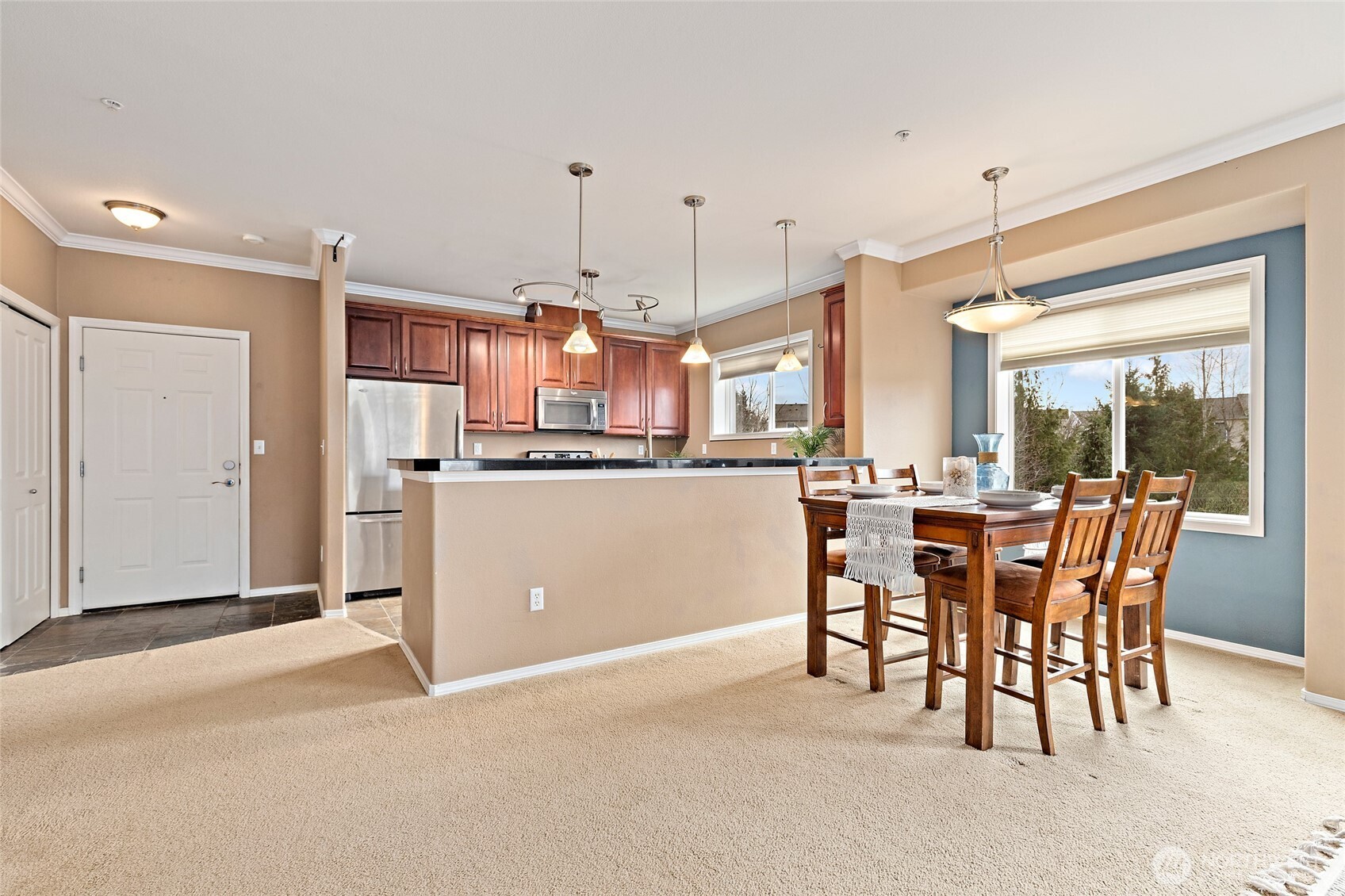 14915 38th Drive Southeast, Unit 2049 Bothell, WA 98012 - Photo 7 of 36 a dining room with furniture and window