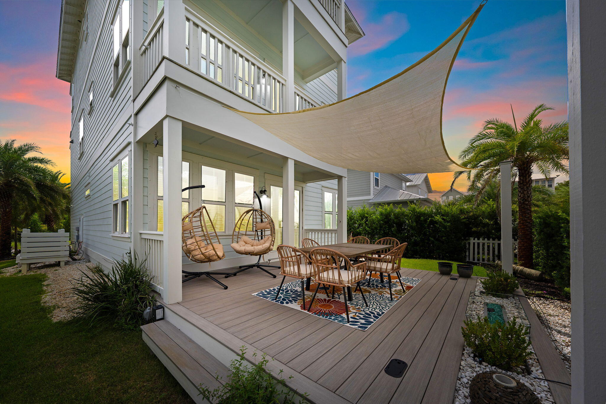79 Grande Pointe Drive Inlet Beach, FL 32461 - Photo 2 of 47 a view of a house with backyard sitting area and garden