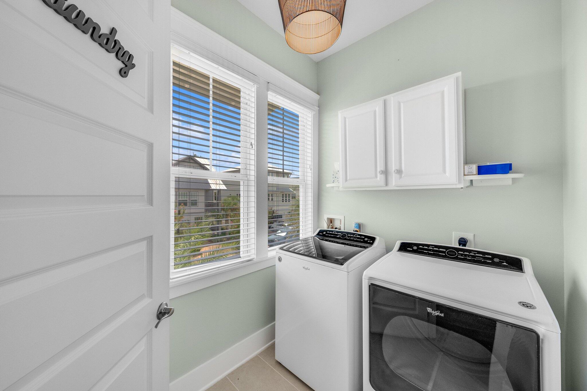 79 Grande Pointe Drive Inlet Beach, FL 32461 - Photo 25 of 47 a view of storage and utility room with washer and dryer