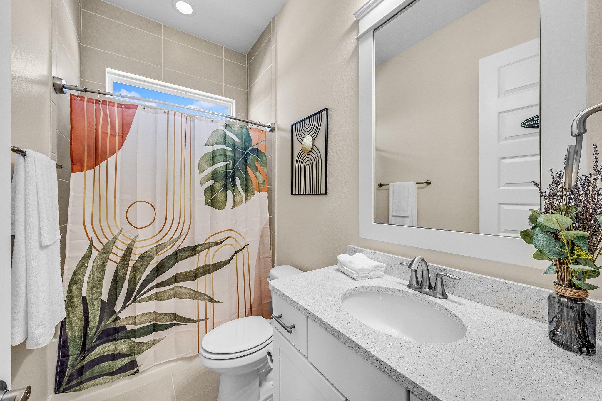 79 Grande Pointe Drive Inlet Beach, FL 32461 - Photo 30 of 47 a bathroom with a granite countertop sink and a mirror