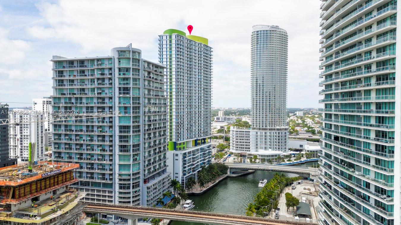 185 Southwest 7th Street, Unit 1508 Miami, FL 33130 - Photo 26 of 30 a view of balcony with a potted plant