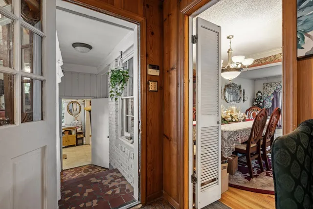 a view of a hallway and interior of the house