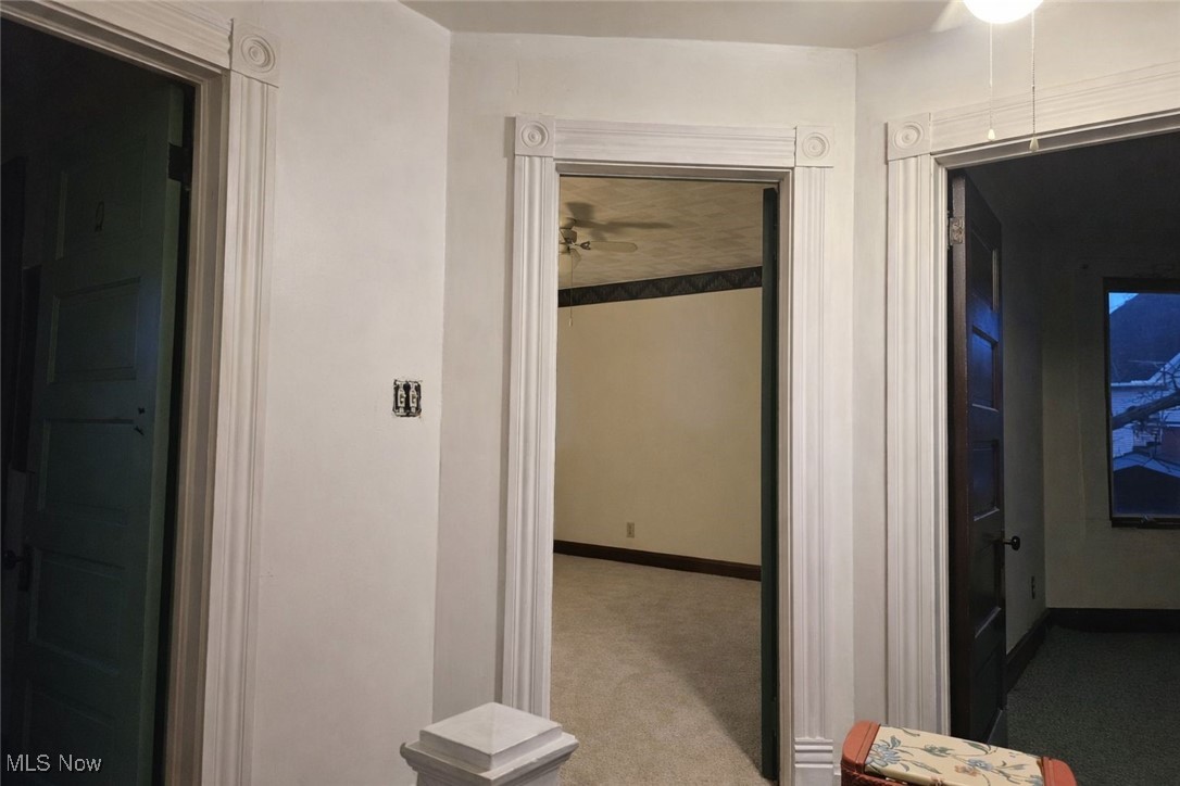 279 Coitsville Road Campbell, OH 44405 - Photo 10 of 20 Hall featuring light carpet and baseboards