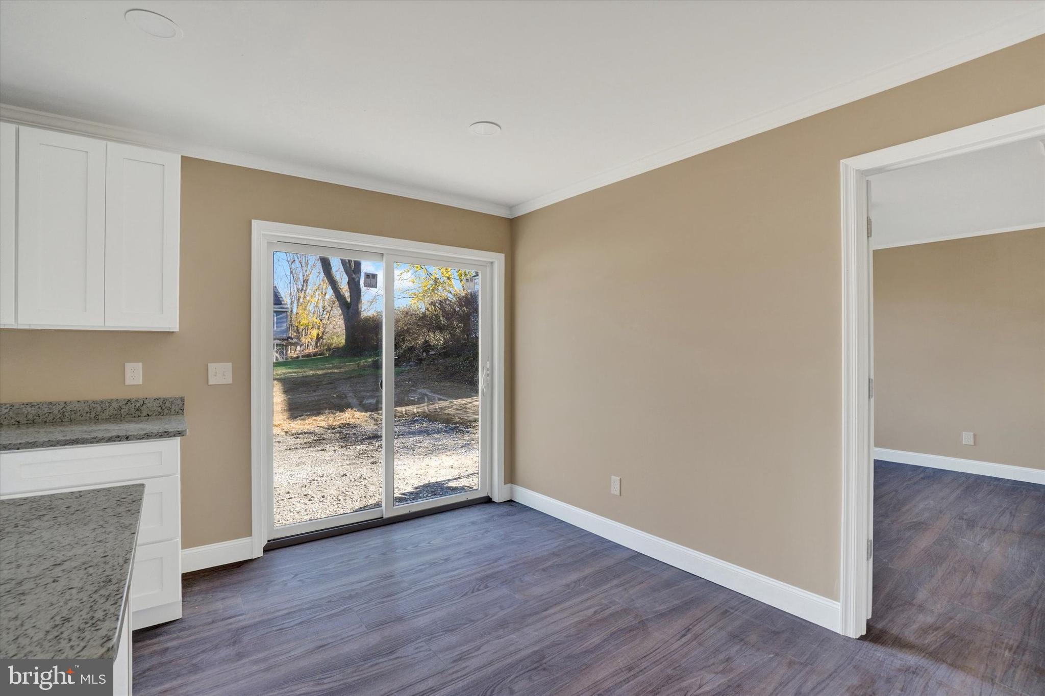 415 Lampeter Road Lancaster, PA 17602 - Photo 19 of 30 a view of a room with wooden floor and fireplace