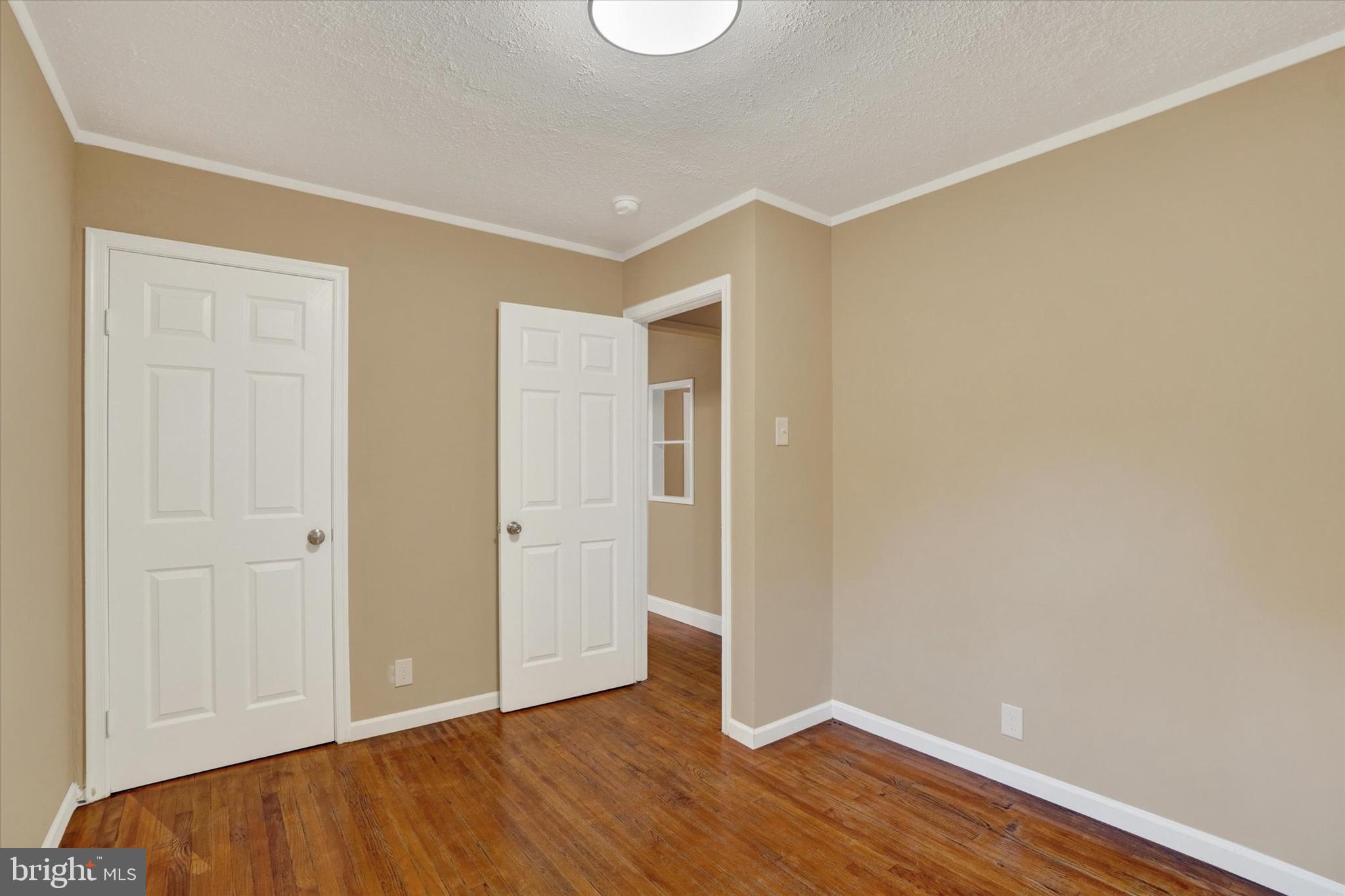 415 Lampeter Road Lancaster, PA 17602 - Photo 21 of 30 a view of an empty room with wooden floor