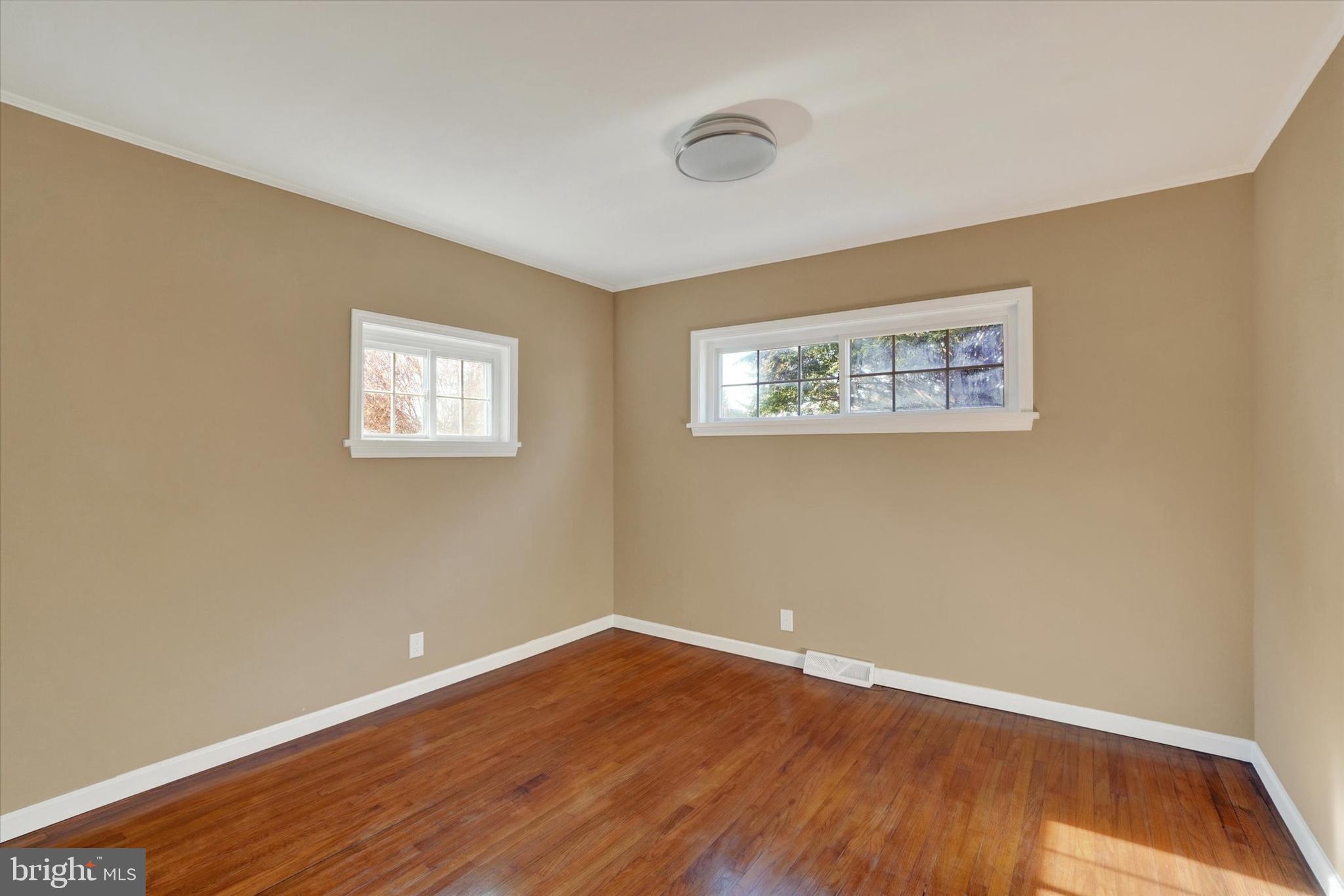 415 Lampeter Road Lancaster, PA 17602 - Photo 24 of 30 a view of a room with wooden floor and window
