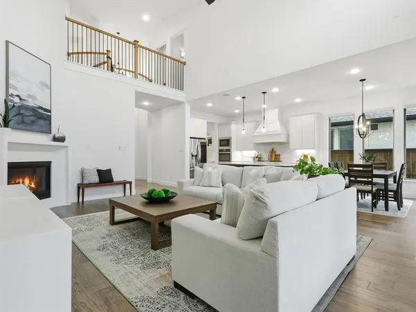 a living room with furniture and a table