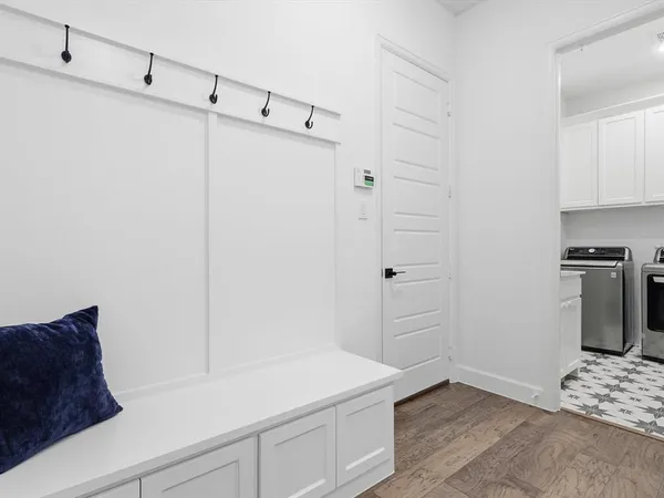 a room that has a refrigerator and a stove