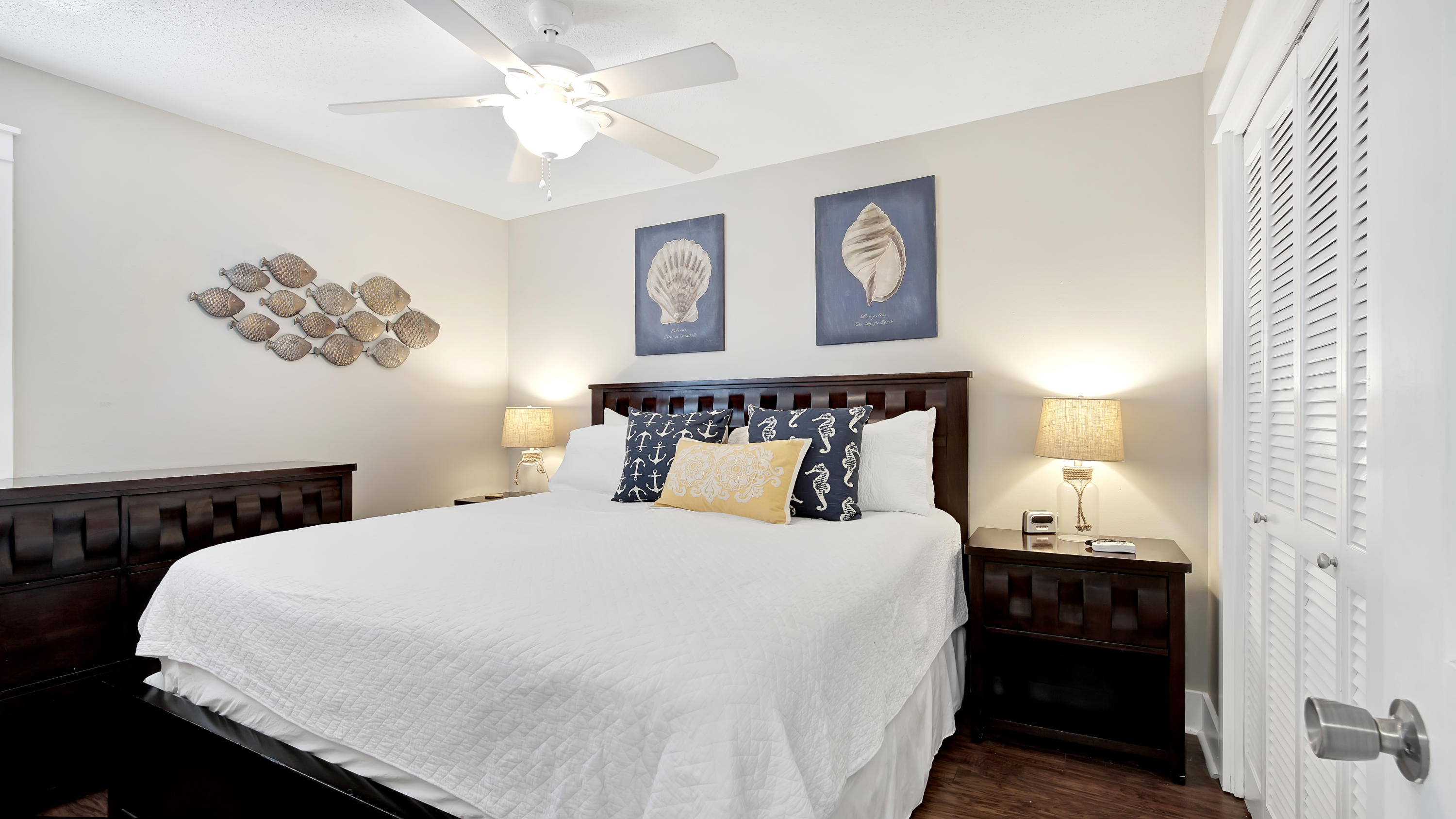 3799 East County Highway 30A, Unit F2 Santa Rosa Beach, FL 32459 - Photo 17 of 25 a bedroom with a bed and lamp