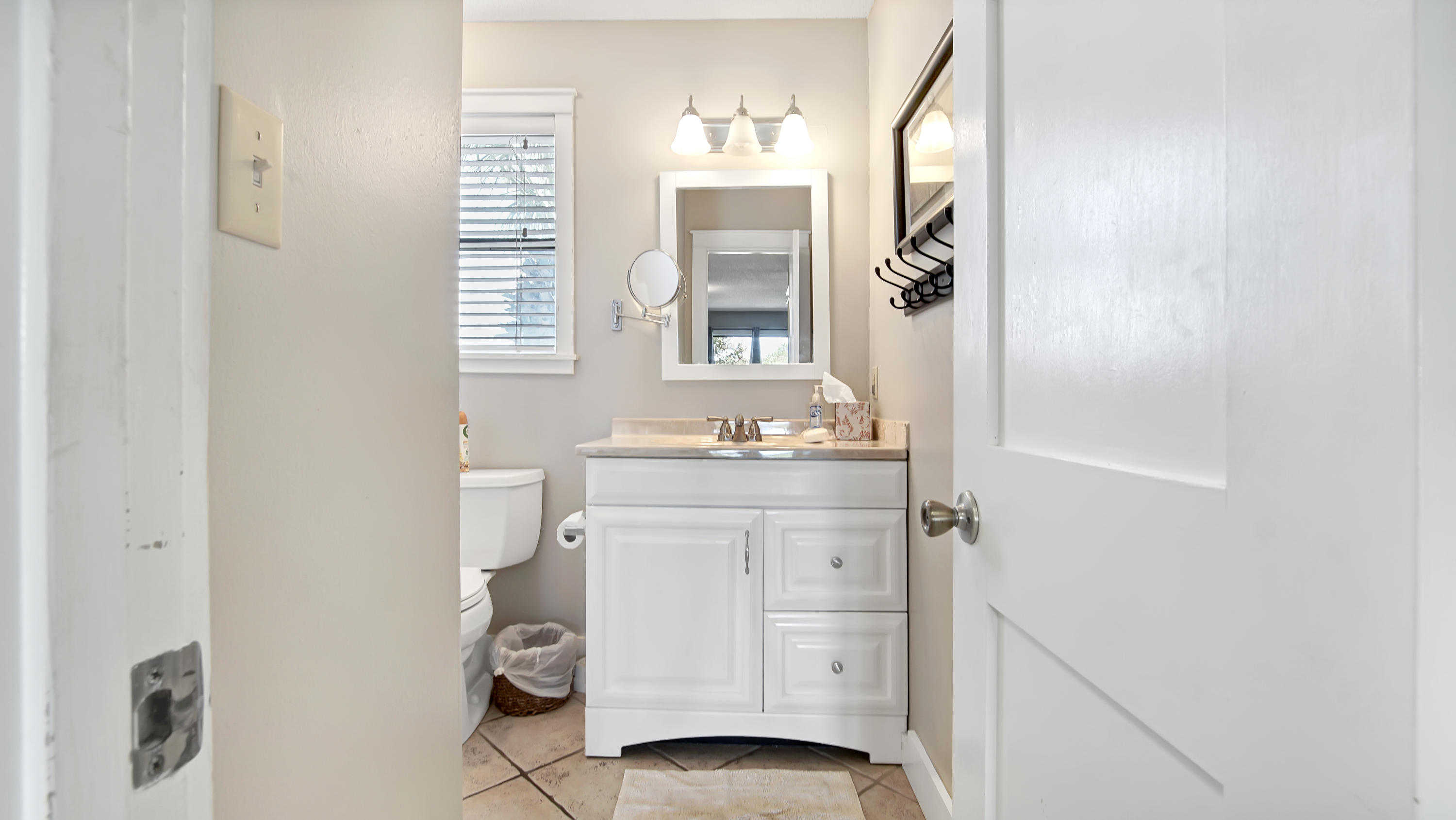 3799 East County Highway 30A, Unit F2 Santa Rosa Beach, FL 32459 - Photo 19 of 25 a bathroom with a sink and a mirror