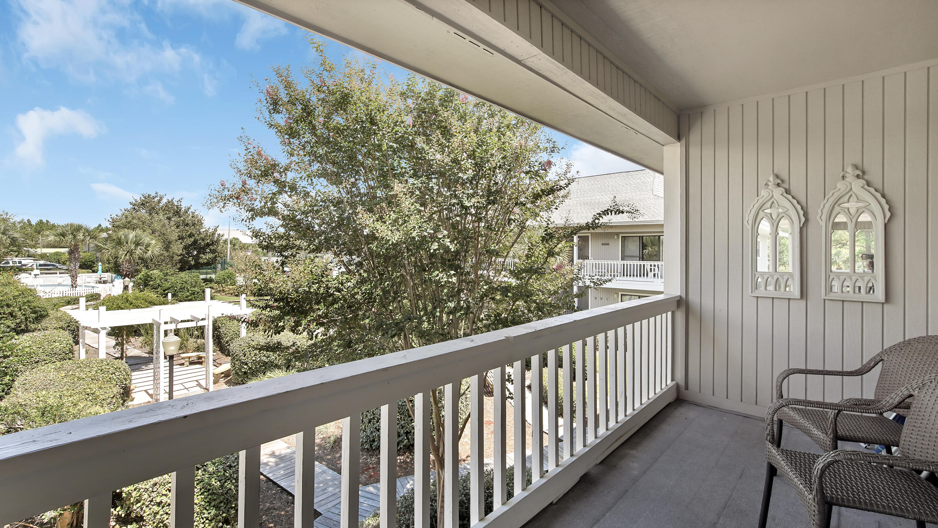 3799 East County Highway 30A, Unit F2 Santa Rosa Beach, FL 32459 - Photo 23 of 25 a view of a balcony with wooden floor
