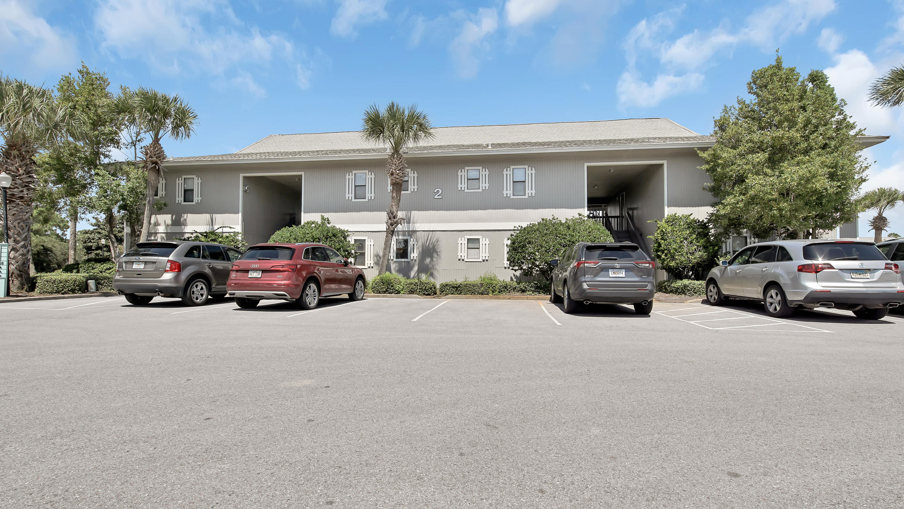 3799 East County Highway 30A, Unit F2 Santa Rosa Beach, FL 32459 - Photo 3 of 25 a car parked in front of a house