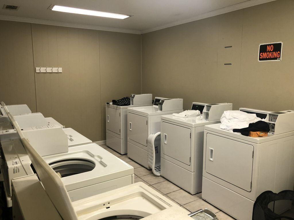 3799 East County Highway 30A, Unit F2 Santa Rosa Beach, FL 32459 - Photo 6 of 25 a utility room with dryer and washer