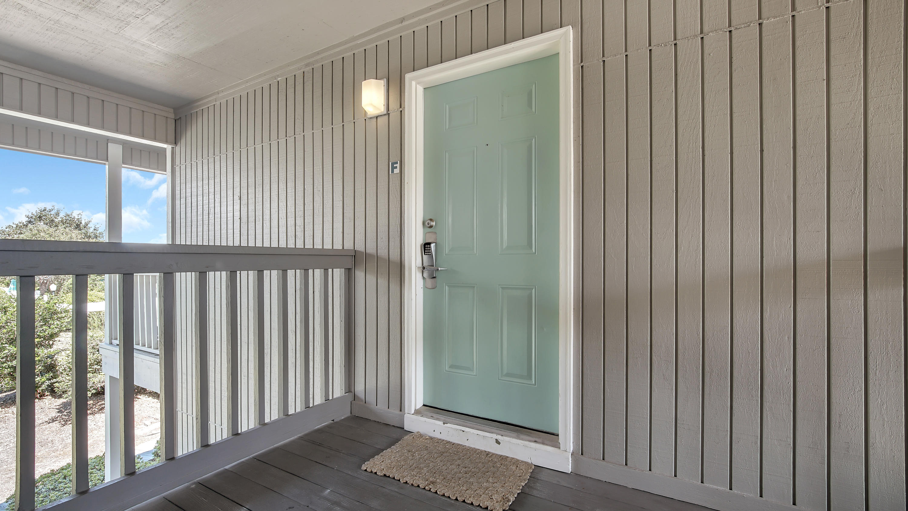 3799 East County Highway 30A, Unit F2 Santa Rosa Beach, FL 32459 - Photo 10 of 25 a view of a hallway with wooden floor
