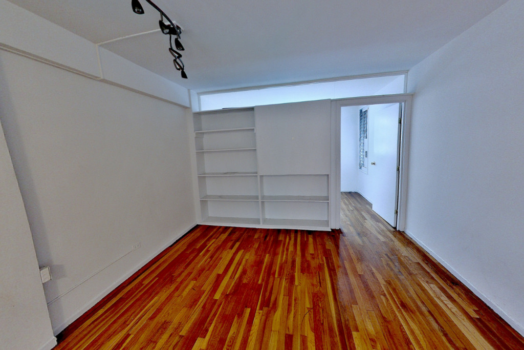 a view of a room with wooden floors and lots of wooden floor